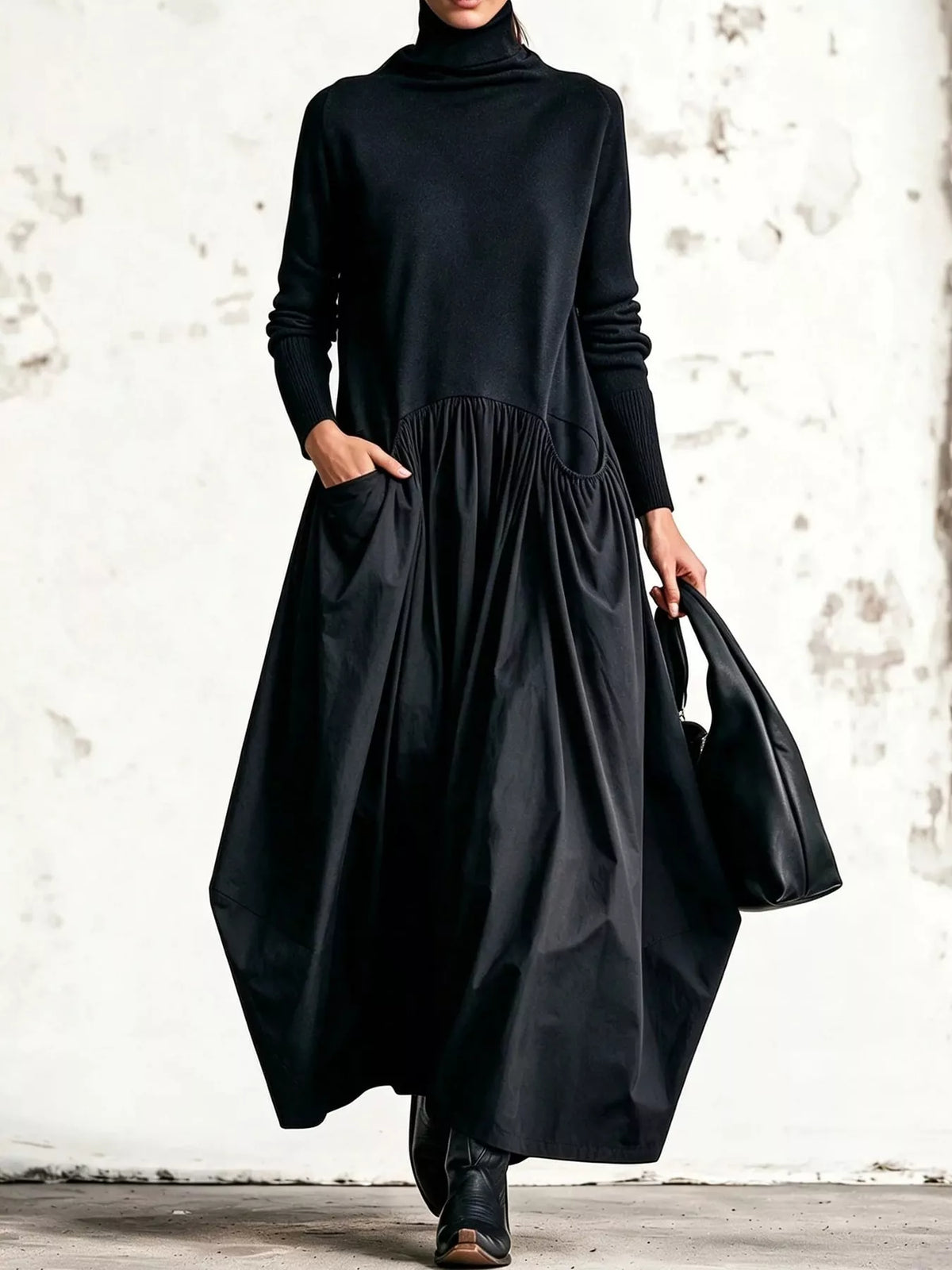Front view of deep plum turtleneck maxi dress with fitted knit top and gathered volume skirt