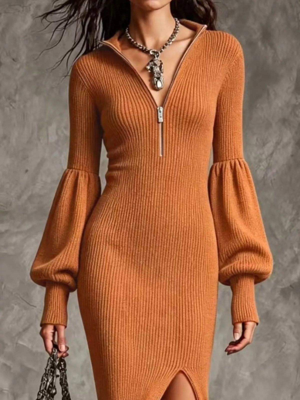 Model wearing the Season Prestige ribbed knit quarter-zip midi dress in ochre with lantern sleeves and a front slit